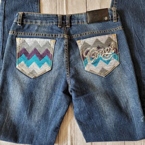 Coogi Women's Distressed Skinny Jeans •Size 7/8•